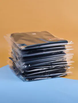 Clothing packed in poly bags, ready for dispatch – apparel logistics and fulfillment at RAVEN